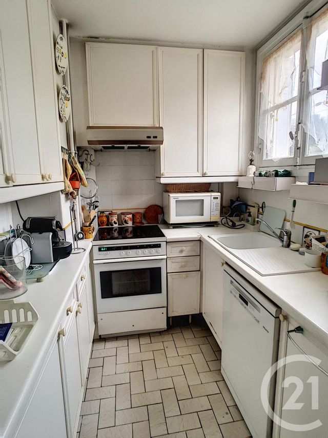 Afficher la photo en grand Appartement F3 à vendre - 3 pièces - 96.17 m2 - ST CLOUD - 92 - ILE-DE-FRANCE - Century 21 Solution Immobilière
