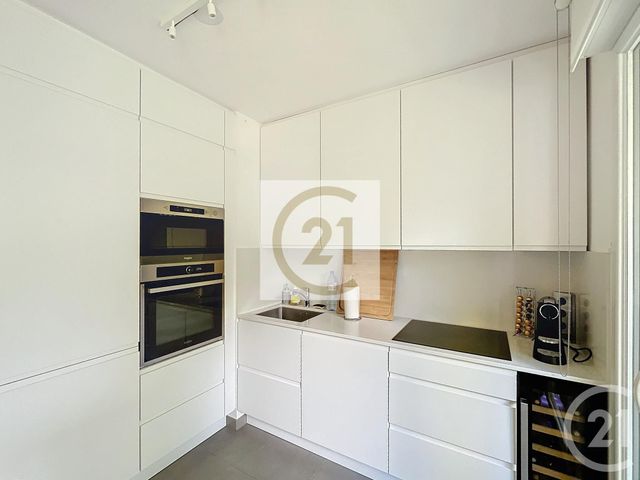 Afficher la photo en grand Appartement F3 à louer - 3 pièces - 68.08 m2 - ST CLOUD - 92 - ILE-DE-FRANCE - Century 21 Solution Immobilière